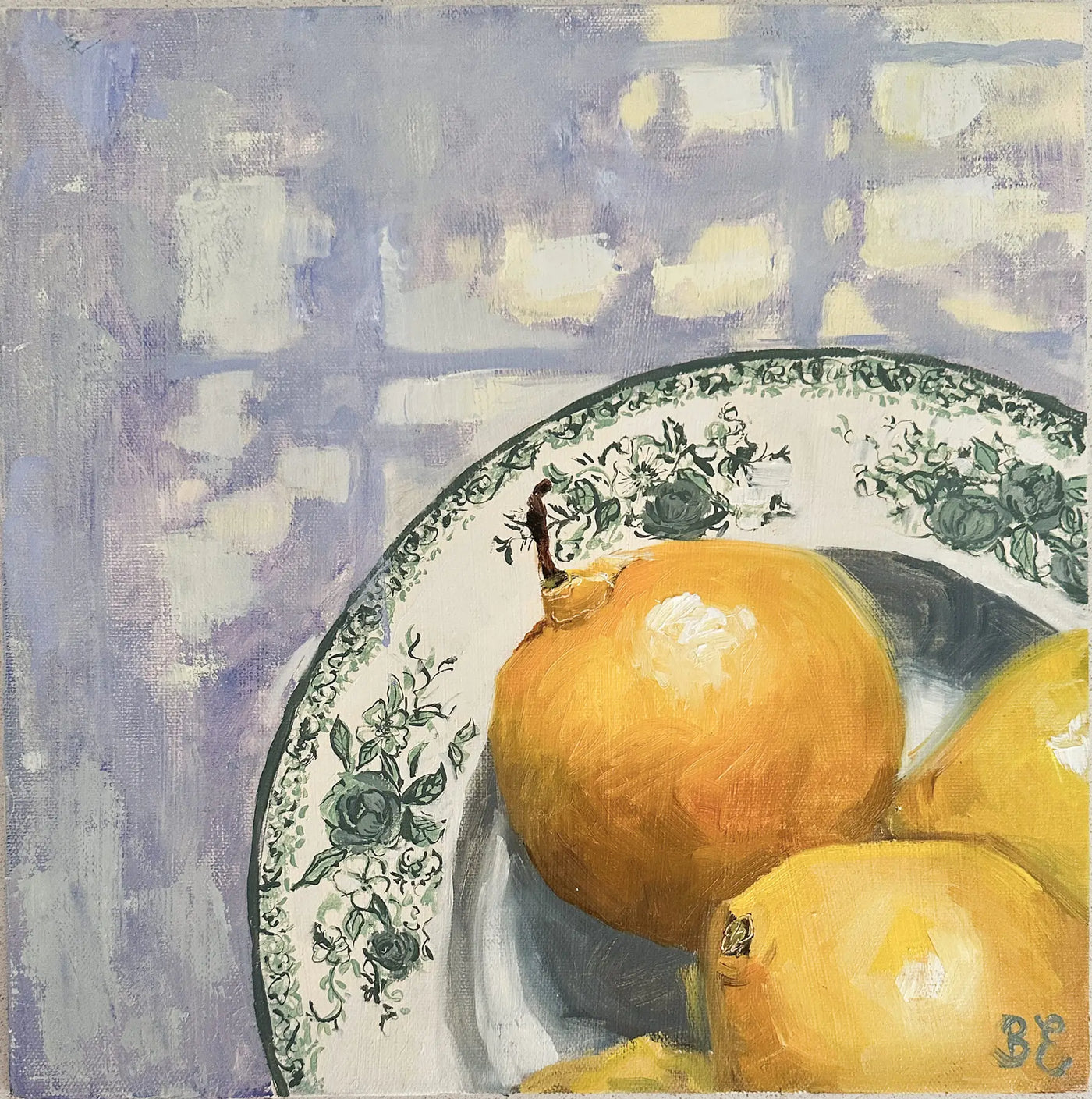 Still life painting of lemons on a decorative plate with a window leaving dappled shadow in the background