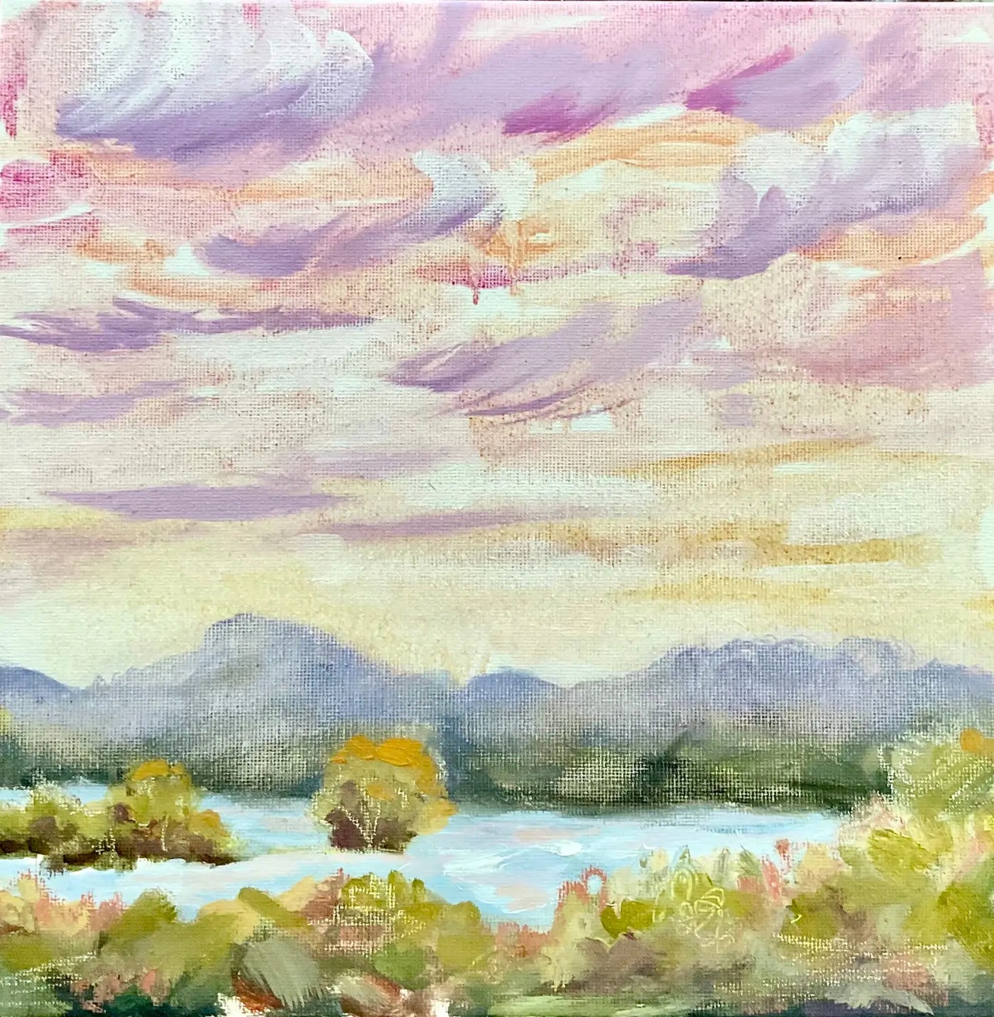 An impressionistic landscape painting of Redland Bay waterfront. Looking out the Moreton bay islands, featuring a pastel sky with lavender, pink, and cream clouds, distant blue islands, a pale blue body of water, and green and yellow foreground foliage of the mangroves.