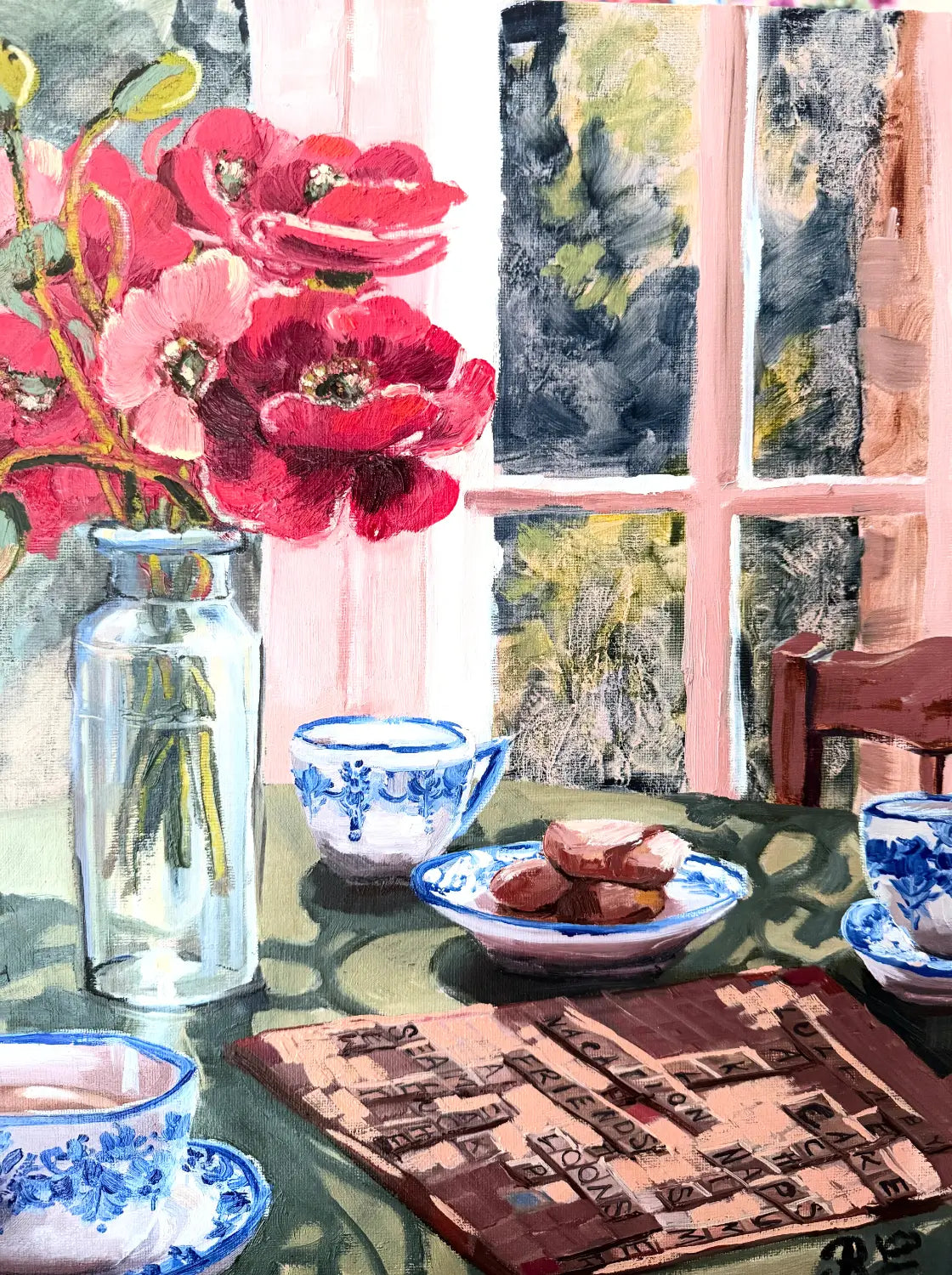 Personalised still life painting of someones favourite objects. Oil painting of a tea-time scene with red and pink poppies in a glass vase, blue-and-white teacups, a plate of cookies, and a game of scrabble on a table in front of a window.