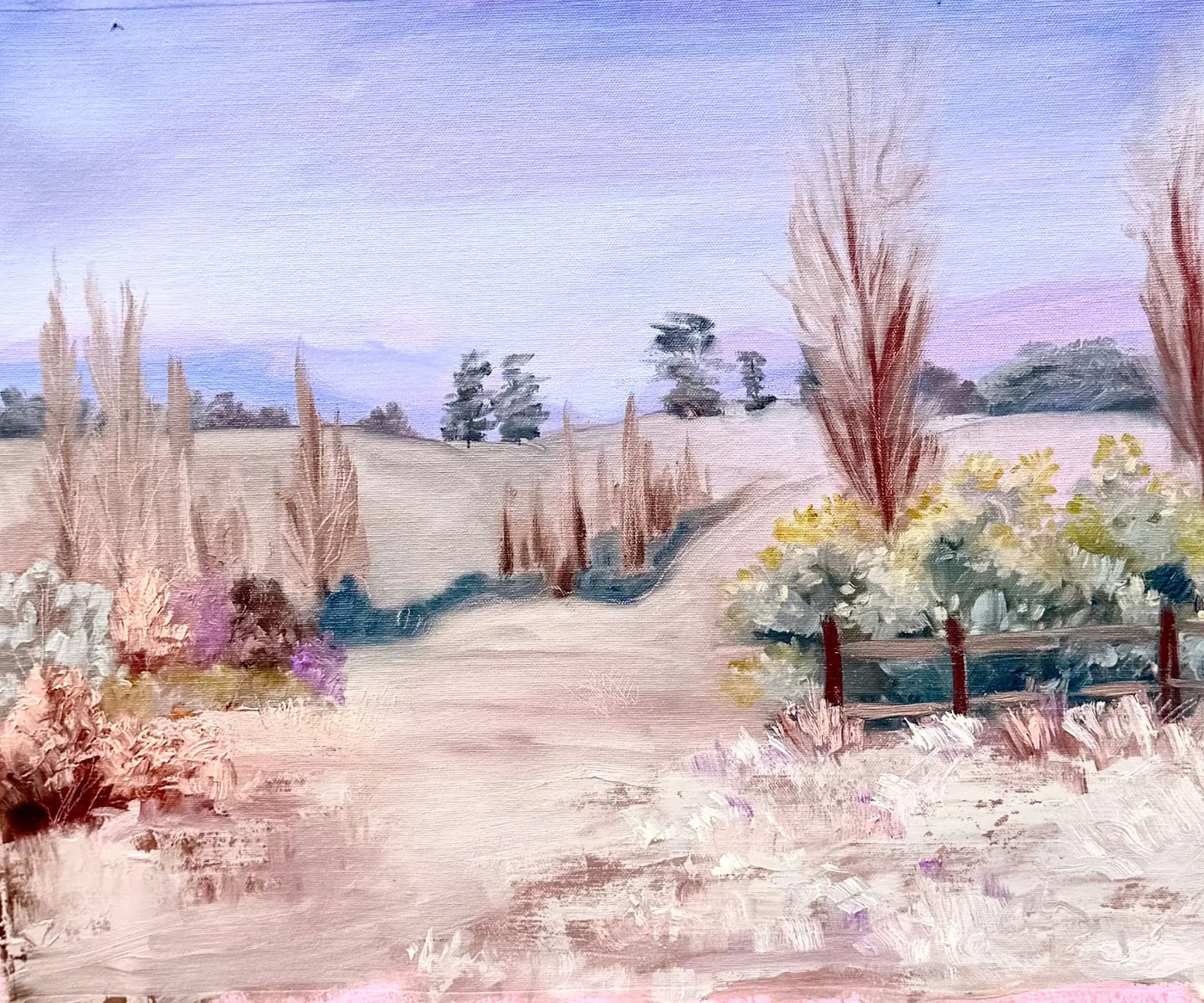 A soft pastel coloured landscape painting in oils. Showing the Australian winter on a country farm. A pale path winding through a textured field, with tall leafless trees, shrubs, a small fence, distant trees, and a lavender-blue sky.